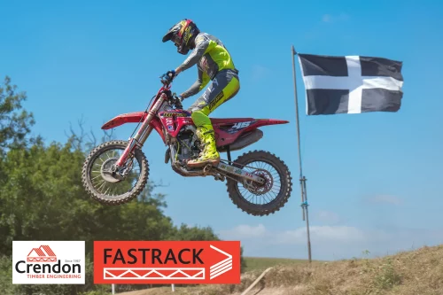 Nicholls flies past the Cornish flag in the scorching conditions