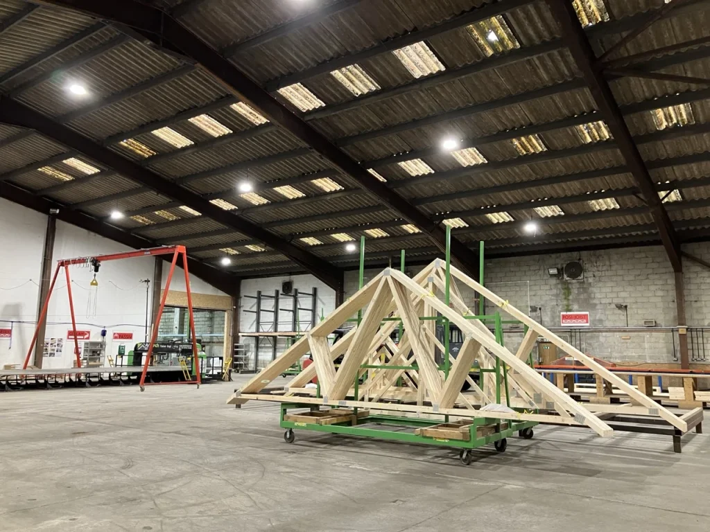 Inside of timber factory with roof trusses