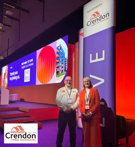 A picture of two people on the side of a stage.